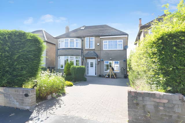 The substantial detached frontage opens onto a large private driveway, giving this six-bedroom Leeds home an impressive arrival