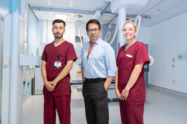 Dr Bobby Bhartia, Consultant Radiologist (pictured centre), with two radiographers based at St James’s Hospital in Leeds.