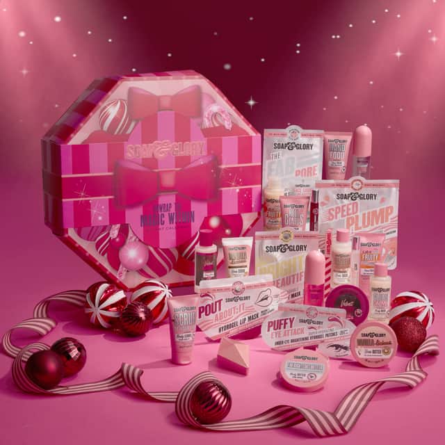 The Soap & Glory Unwrap The Magic Within 24 Piece Advent Calendar contains 24 beauty and pampering treats.