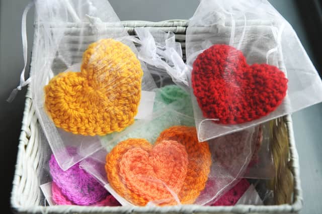 The colourful crochet hearts are designed to support patients and families during end-of-life care
