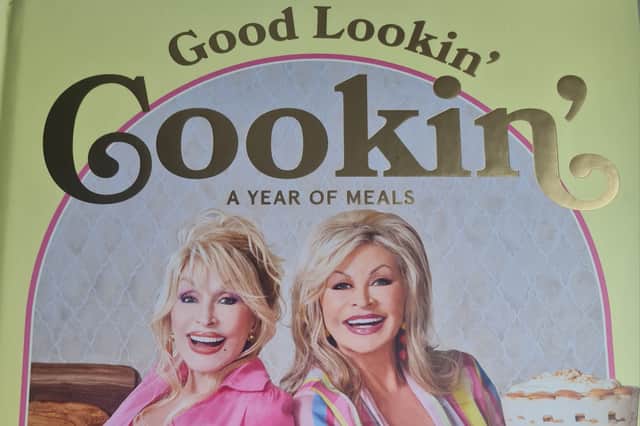 The cover of Dolly Parton's cookbook with her sister, Rachel Parton-George, called Good Lookin' Cookin'