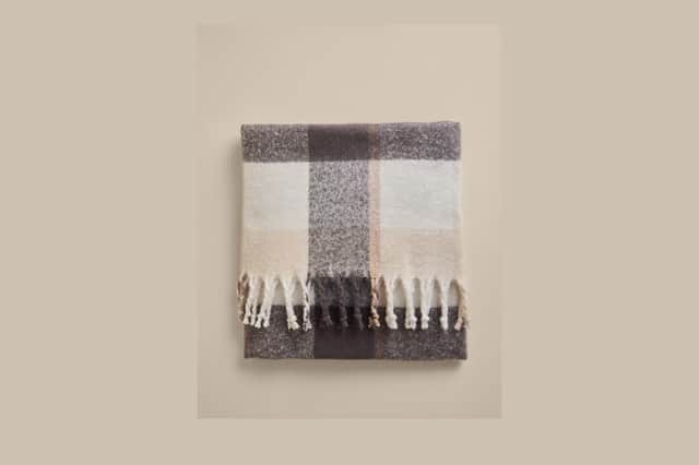 M&S faux mohair checked throw in a soft textured design