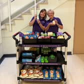 Trolley volunteers Kirsty and Sally with the Charity Trolley.