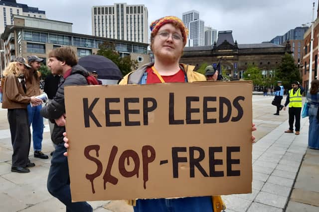Protestors carried signs criticising Microsoft and AI at their last gathering in early September
