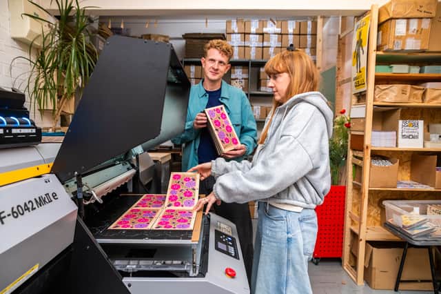 Jakob and Freya print products at their Dock Street studio