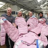 Yorkshire Children’s Charity’s (YCC) warehouse as staff and volunteers begin packing thousands of coats, shoes, pyjamas and bedding to support children across Yorkshire 