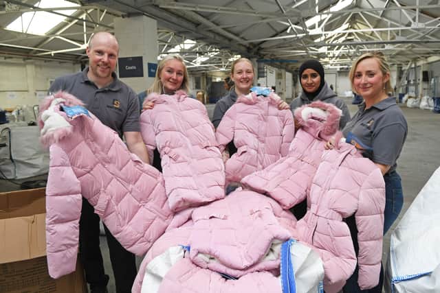 Yorkshire Children’s Charity’s (YCC) warehouse as staff and volunteers begin packing thousands of coats, shoes, pyjamas and bedding to support children across Yorkshire 