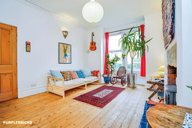 The open-plan reception space brings the lounge and dining areas together