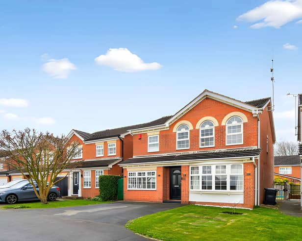 The detached home makes an immediate impression from its frontage, with ample off-street parking adding practical appeal