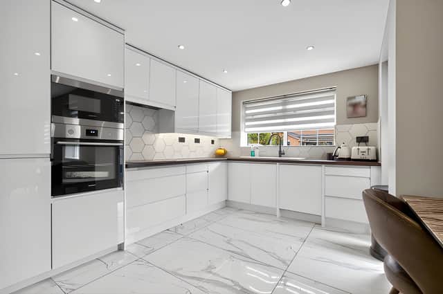 A luxury fitted kitchen, diner and family room creates a spacious central hub with integrated appliances
