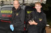 Warren Peaker, owner of Leeds pest control company Warren and Sons, with son Tyler and Mouse the dog.