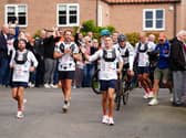 Sir Kevin Sinfield (centre) is joined by Sir Gareth Southgate as he arrives at Shiptonthorpe Village Hall at the end of day one of the 7 in 7: The Grand Finale 2026 Challenge