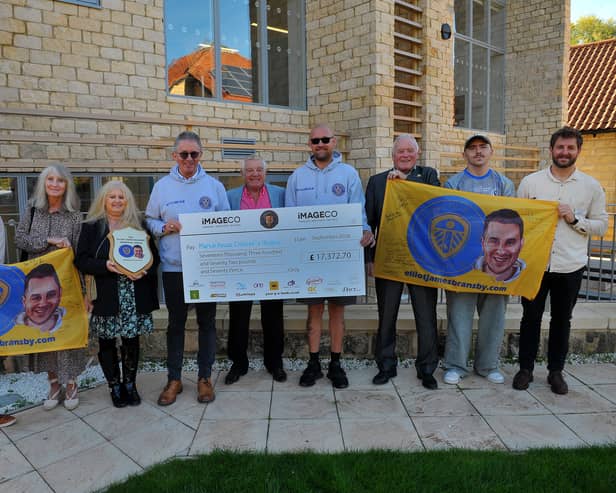 Elliot James Bransby Memorial Shield  presentation of £17, 320.70 to Martin House Hospice from the recent football game at the South Leeds Stadium, from left, Bobby Sharma, Yorkshire Indian, Linda Gray, Donna Bransby, David Bransby, Stix Lockwood, Leeds United Club Ambassador, Simon Wood co-ordinator of the events, Eddie Gray, Finley Barret-Carter singer of Britains Got Talent, Sam Berrill, Regional Fund Raiser Martin House Hospice 