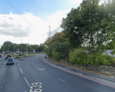 A busy south Leeds route has been closed in both directions following a collision involving a motorcycle and a recovery truck, causing severe traffic delays and bus diversions