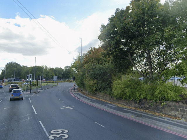 A busy south Leeds route has been closed in both directions following a collision involving a motorcycle and a recovery truck, causing severe traffic delays and bus diversions