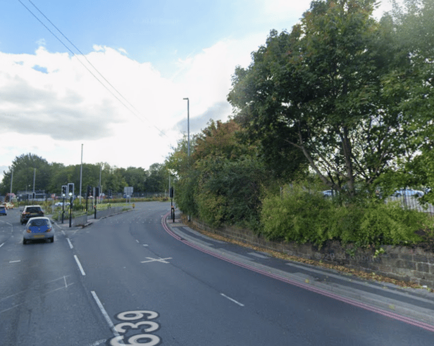 A busy south Leeds route has been closed in both directions following a collision involving a motorcycle and a recovery truck, causing severe traffic delays and bus diversions
