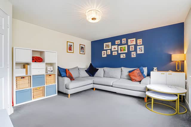 The bright and spacious lounge provides a welcoming main reception room for relaxing and spending time togethe
