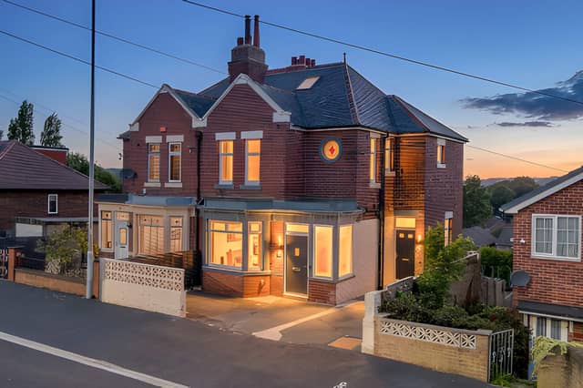 The Green Hill Road property has ample off-road parking to both the front and rear, adding practical space to the substantial four-floor home