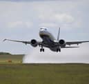 Aircraft taking off and landing at Leeds Bradford Airport.