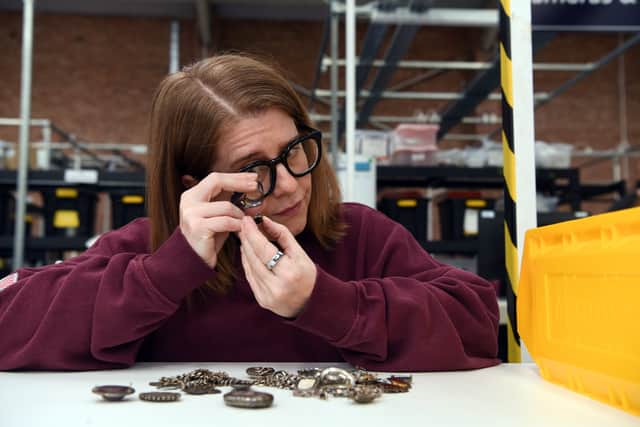 Becs Dunkley checks silver at Vintage.com