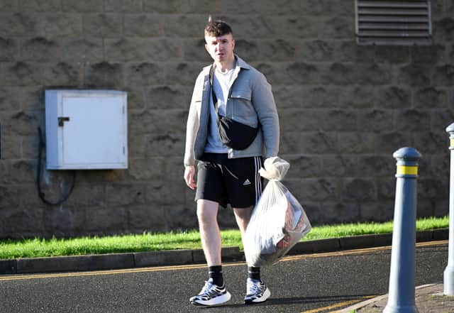 A person leaves HMP Leeds on the day that hundreds of offenders will be released across England & Wales