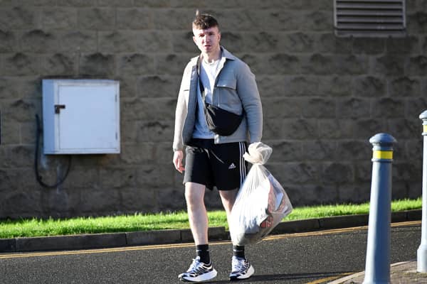 A person leaves HMP Leeds on the day that hundreds of offenders will be released across England & Wales
