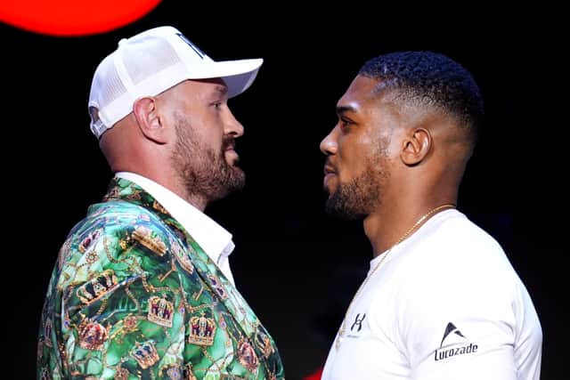 Tyson Fury (left) and Anthony Joshua facing off for the first time