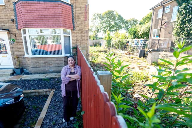 Shivarna Mitra outside her house in Pudsey