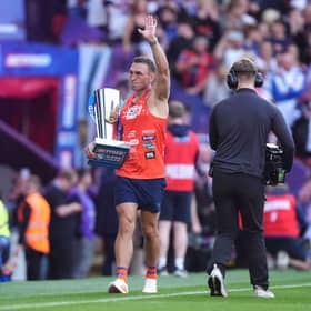 Sir Kevin Sinfield brings out the trophy ahead of the Betfred Super League Grand Final at Old Trafford, Manchester.