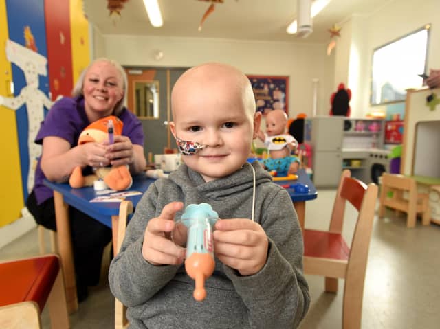 Four-year-old Jenson marks the start of Play in Healthcare Week with Play Specialist Natalie at Leeds Children's Hospital