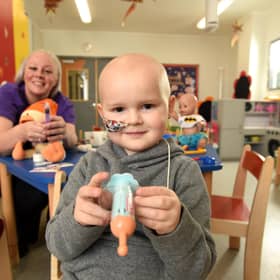 Four-year-old Jenson marks the start of Play in Healthcare Week with Play Specialist Natalie at Leeds Children's Hospital