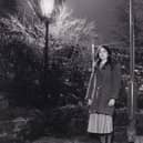 Kathryn Lees pictured in March 1984 with one of the doomed gas lamps.
