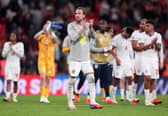 Dominic Calvert-Lewin in the background as England celebrate victory over Czechia.