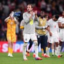 Dominic Calvert-Lewin in the background as England celebrate victory over Czechia.