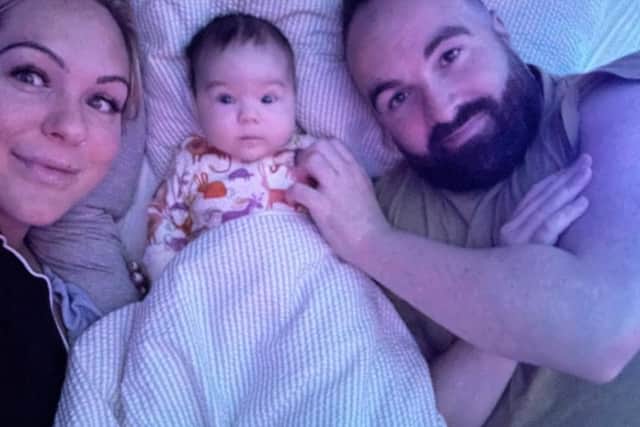 Esta with her mum Lynsey Carr and dad Leon High.