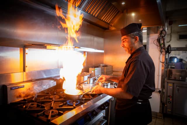 Head chef Tariq Ghumman preparing a starter dish Hakka Paneer at Cinnamon Kitchen 