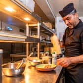Chef of the week - Cinnamon Kitchen at the Queen Hotel, Leeds. Pictured Head chef Tariq Ghumman preparing a starter dish Hakka Paneer - Stir-Fry Honey, Sesame, Soy and Chilli. Picture: James Hardisty. Date: 8th October 2026.