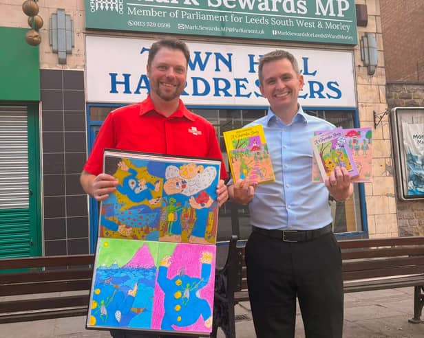 Author and postman Phil Cawood with Mark Sewards MP