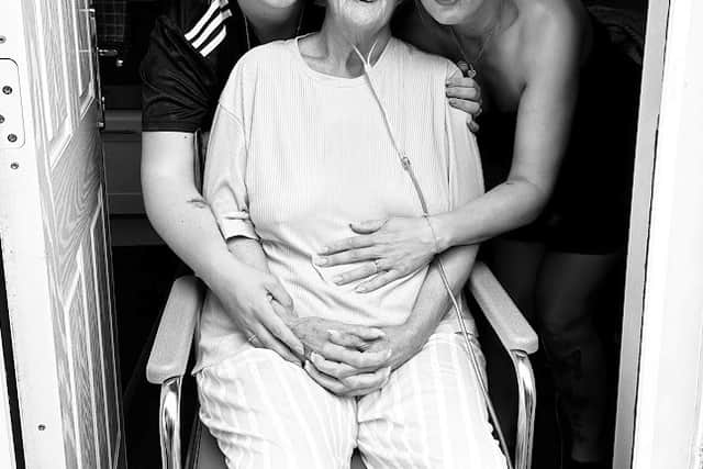Lou with daughters Karis and Lauren.