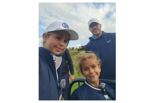 Tilly and her favourite golfer  Brooks Koepka