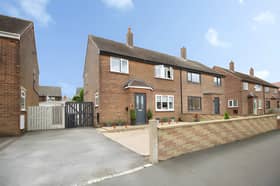The semi-detached house in Home Lea combines a traditional residential setting with driveway parking and access to a private rear garden