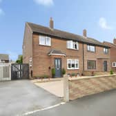The semi-detached house in Home Lea combines a traditional residential setting with driveway parking and access to a private rear garden