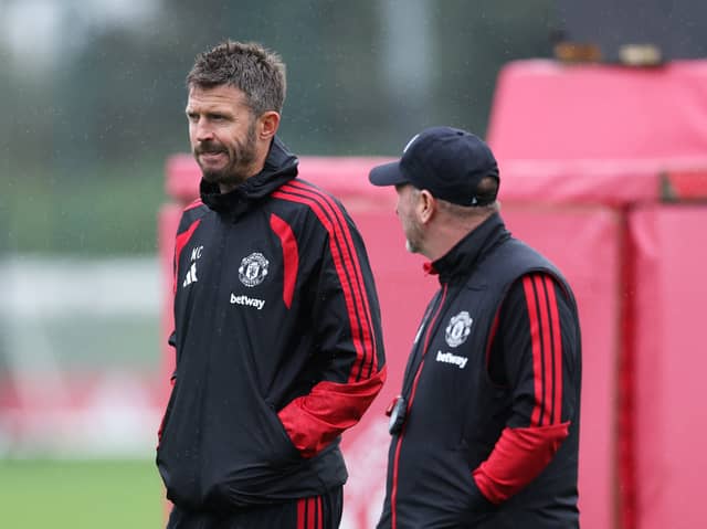 Manchester United boss Michael Carrick was without two key players in an open training session on Monday.