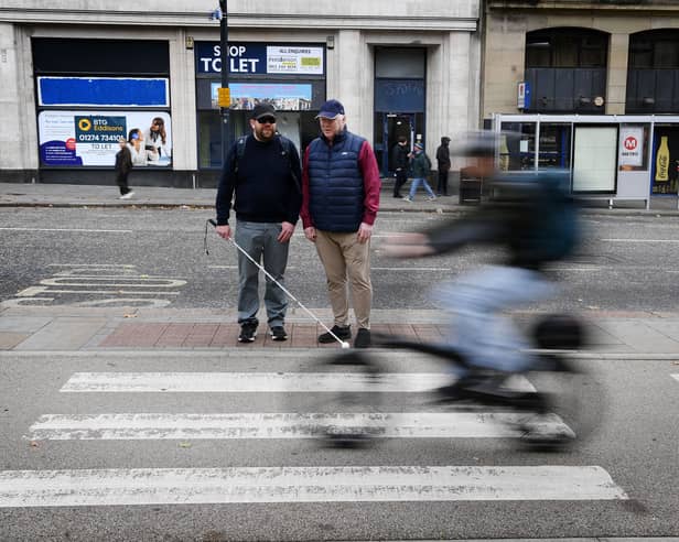 Iain Mitchell (right) and Calum McCready (left), have been speaking out against the new floating bus stops introduced in Leeds.
