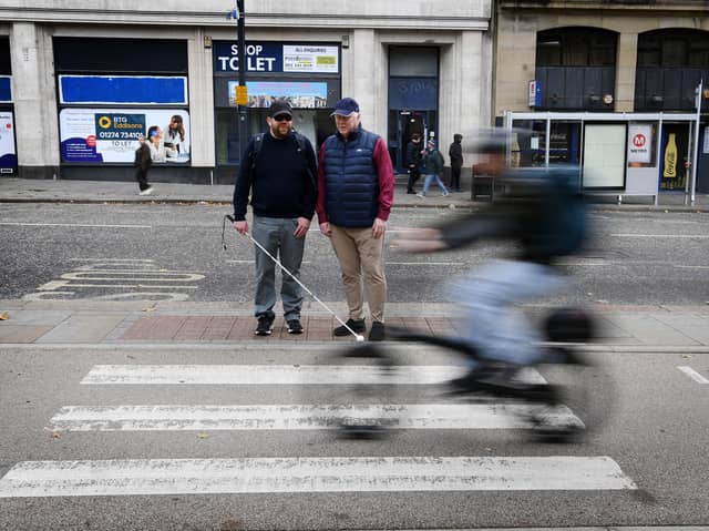 Iain Mitchell (right) and Calum McCready (left), have been speaking out against the new floating bus stops introduced in Leeds.