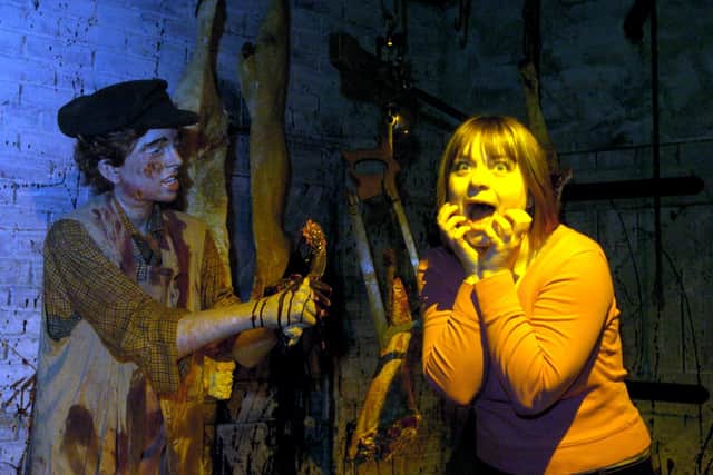Katie Coffield stands in Mr Sowerby Slaughterhouse Yard within the Victorian Street in March 2004.