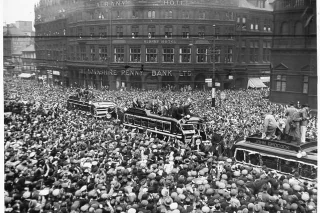 Cheering crowds greeting the Sheffield Wednesday team after their FA Cup win against West Bromwich Albion