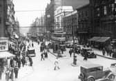 Trams at the junction of Boar Lane and Briggate in Leeds city centre