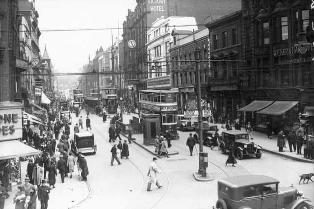Trams at the junction of Boar Lane and Briggate in Leeds city centre