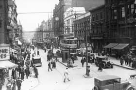 Trams at the junction of Boar Lane and Briggate in Leeds city centre